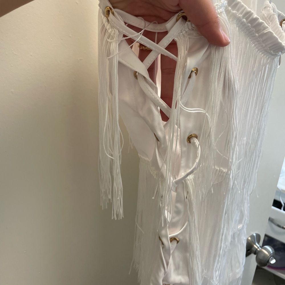 Thomas Runway Boutique white fringe romper. Never worn.